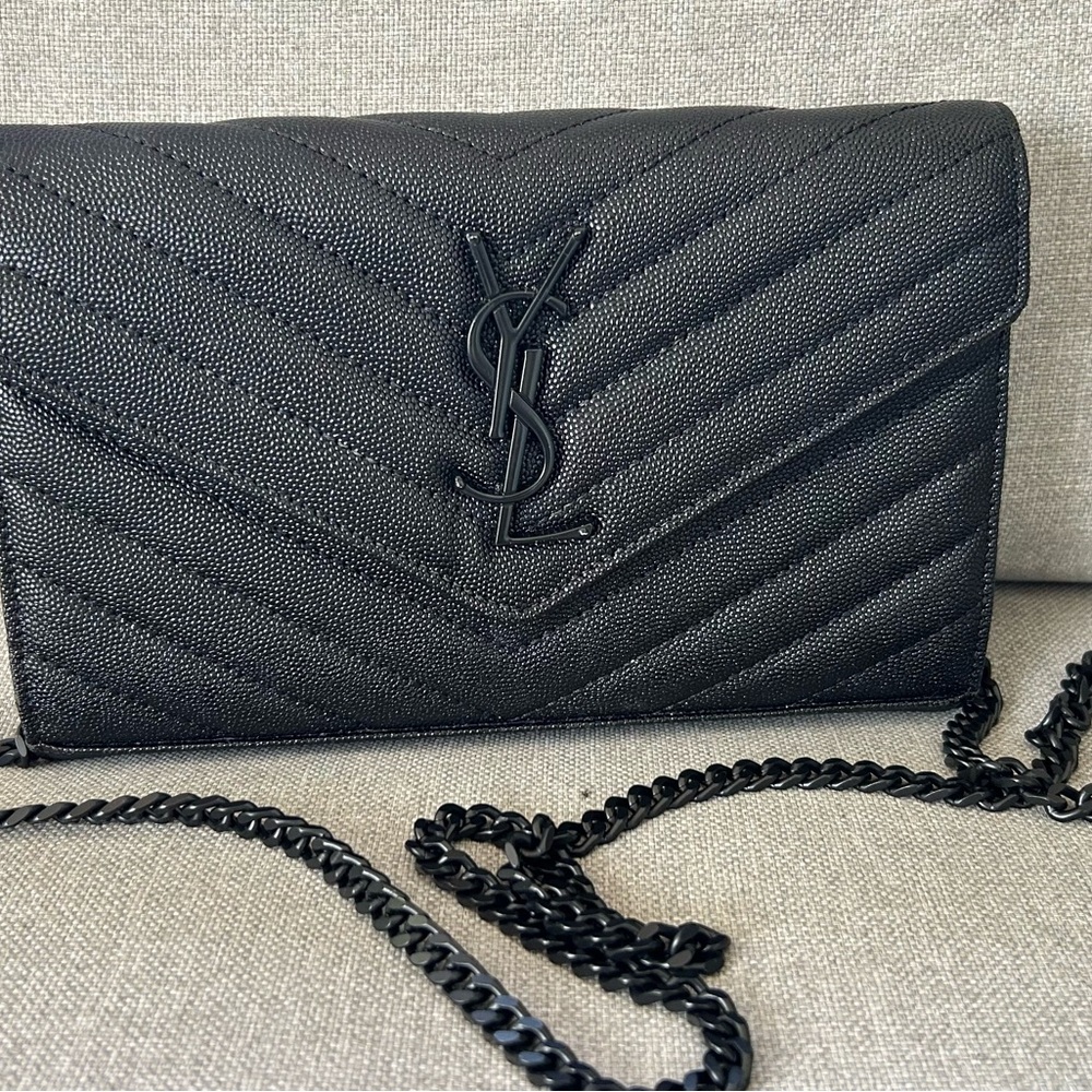 Saint Laurent's Cassandre envelope clutch on chain